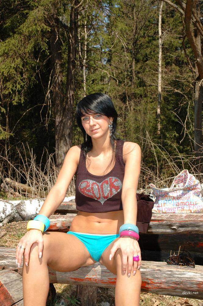 Brunette Strips Outdoors: Explicit Amateur Photo Shoot