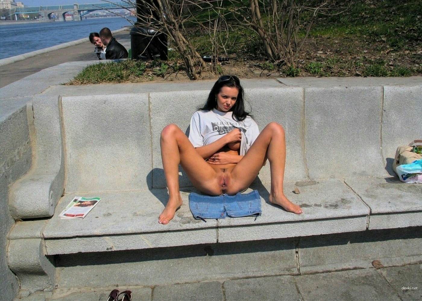Naughty amateur fucks herself in the park - Explicit solo porn photo