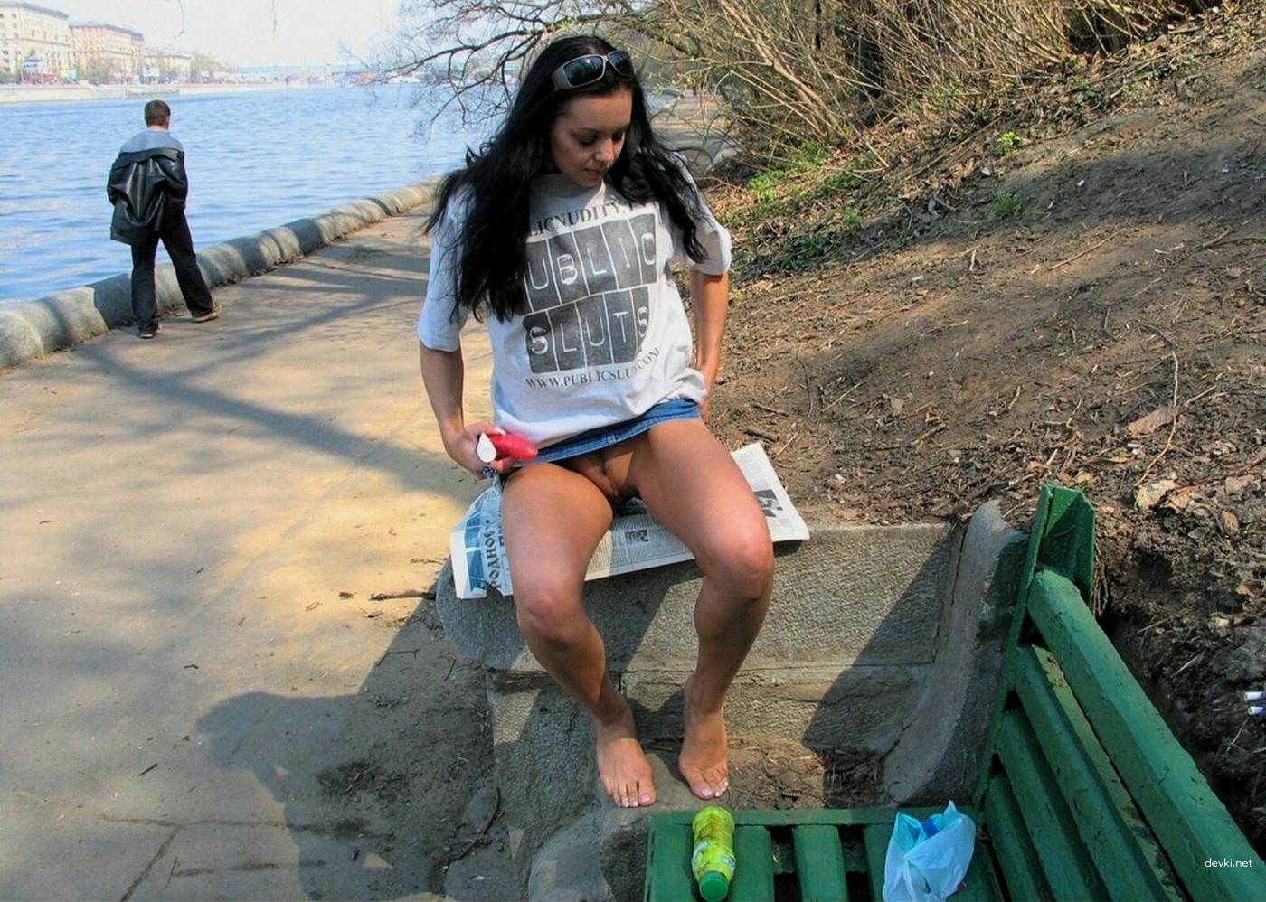 Naughty amateur fucks herself in the park - Explicit solo porn photo