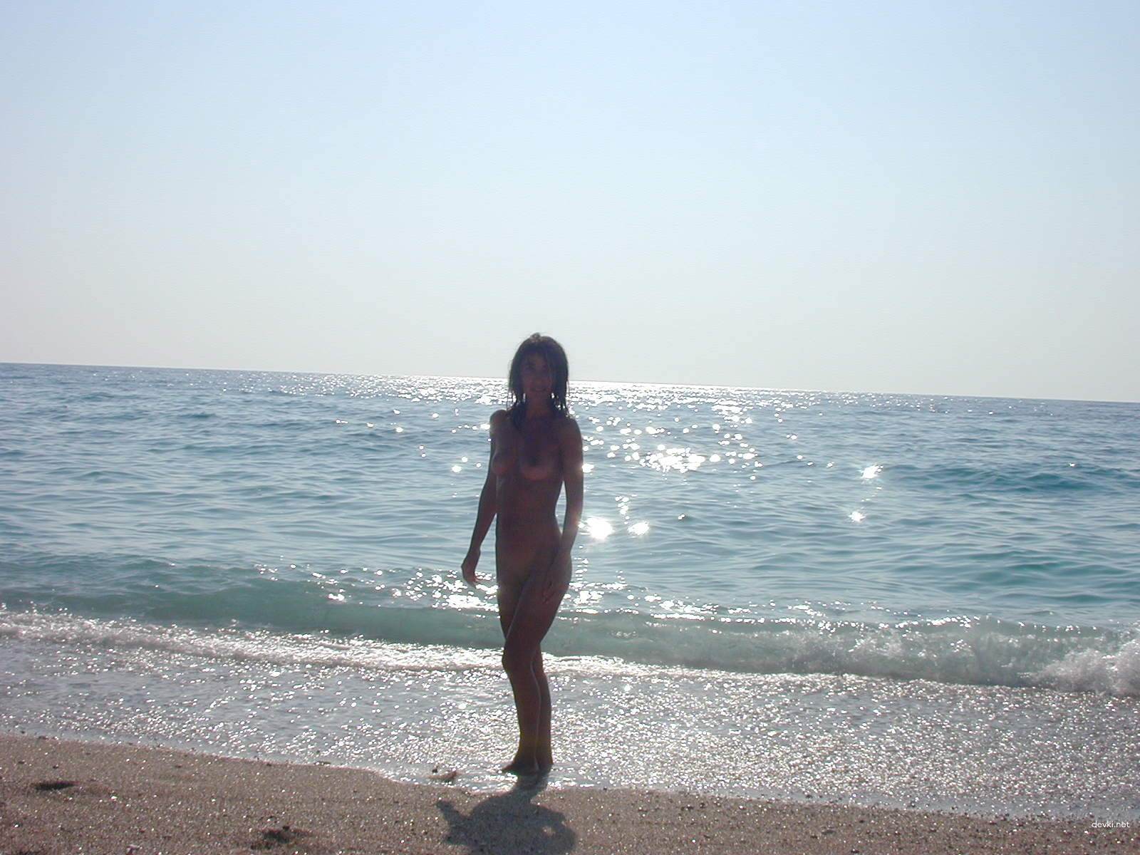 Naked Brunette at the Beach: Explicit Amateur Nude Photo