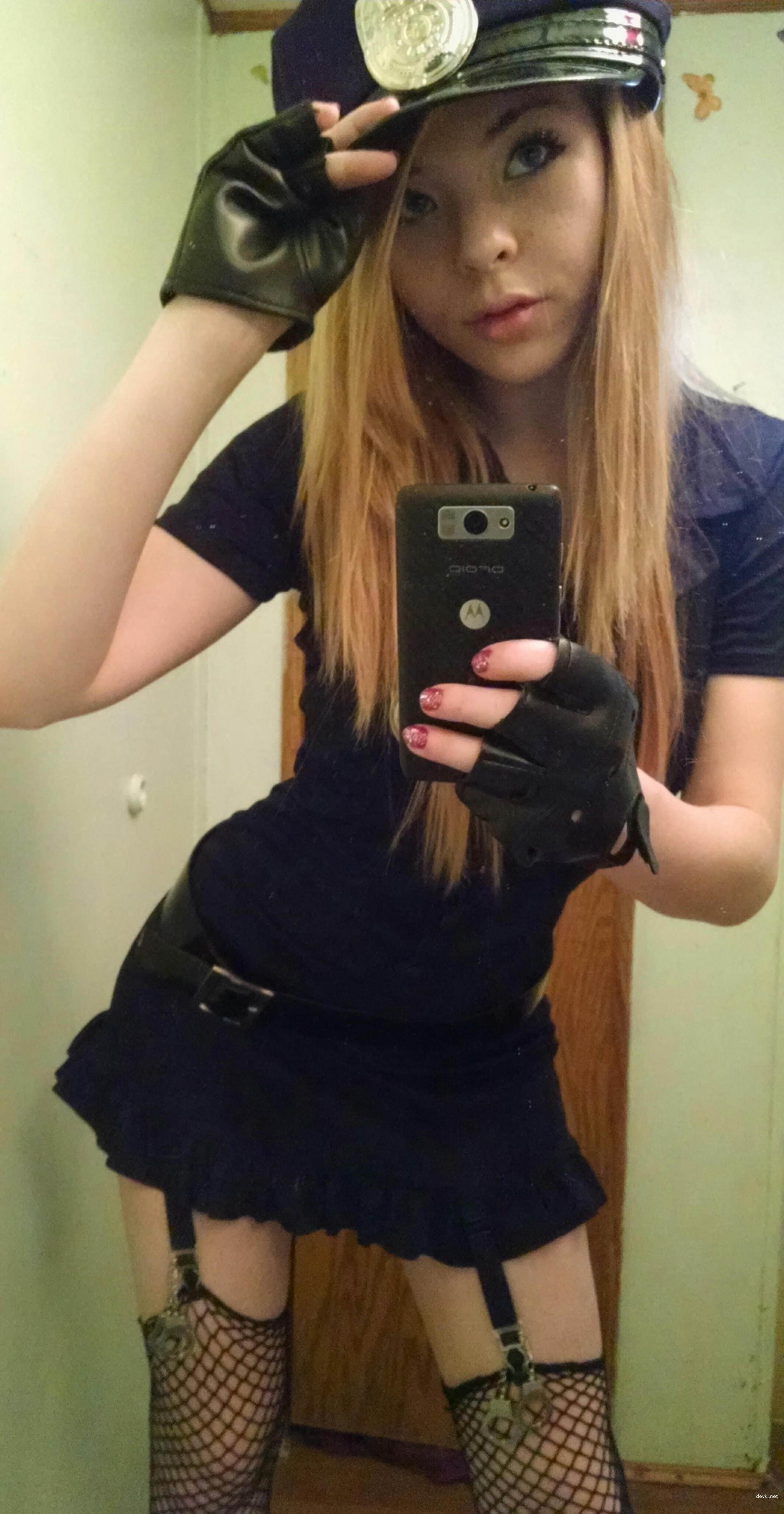 Girl pleasuring her pussy with fingers and dildo in explicit amateur porn photo