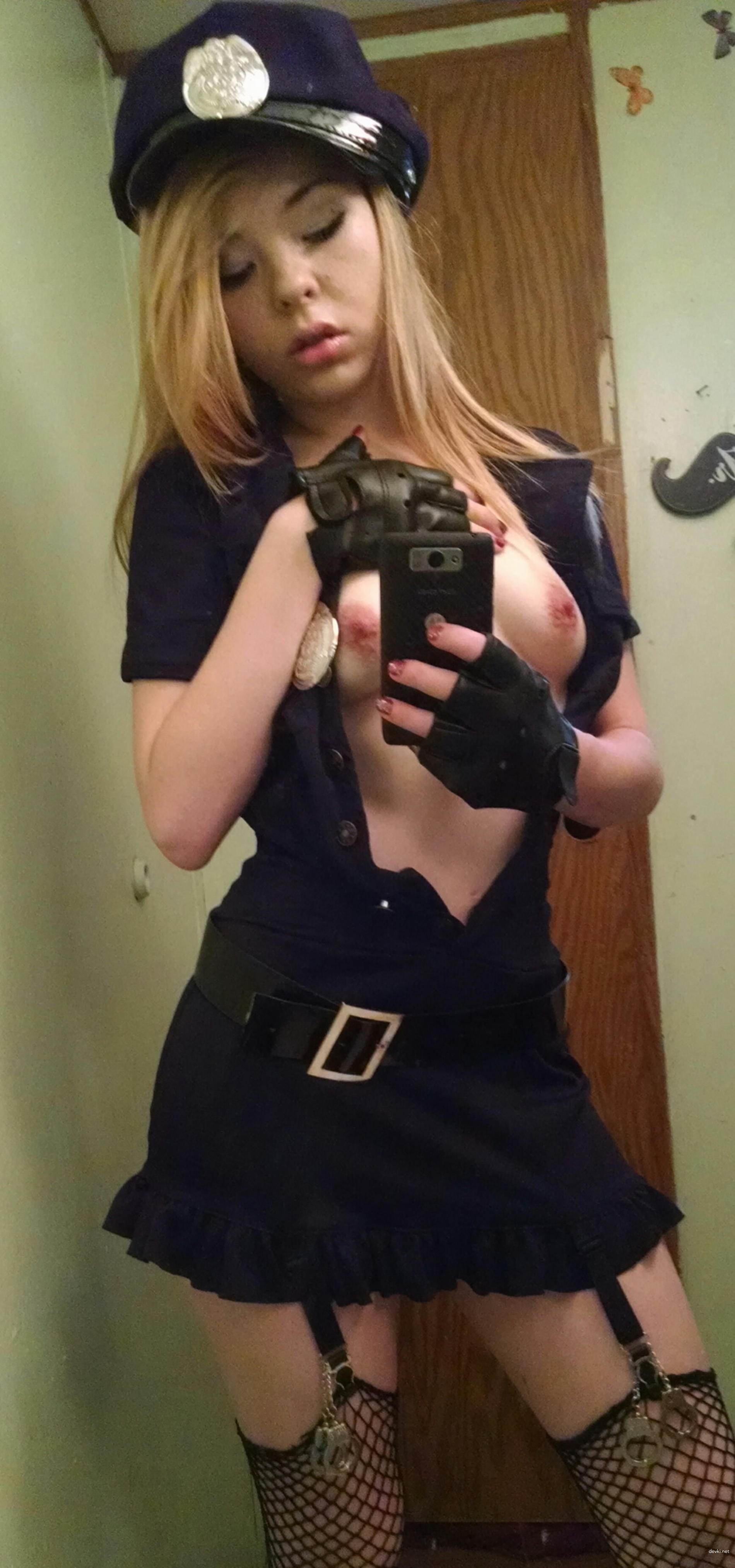 Girl pleasuring her pussy with fingers and dildo in explicit amateur porn photo