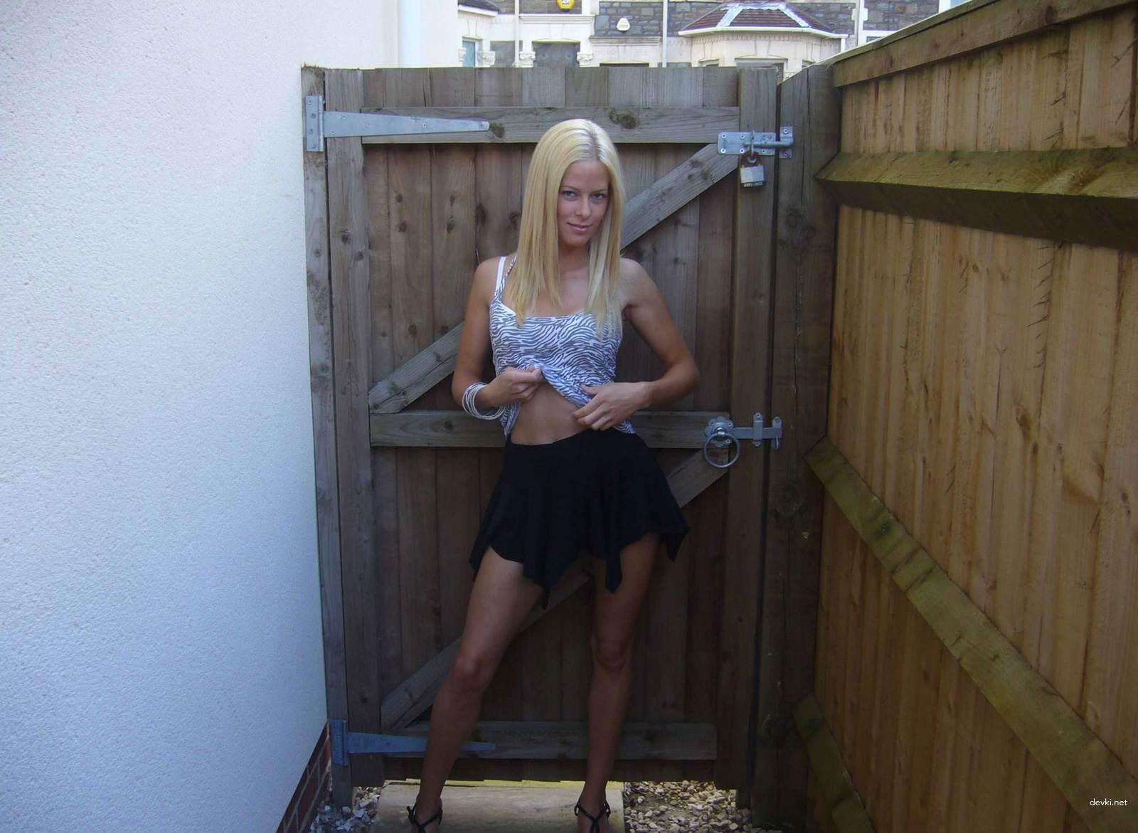 Blonde Pornstar in Red Bed - Explicit Amateur Sex Photos