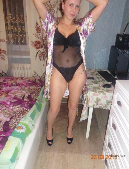 Nurse poses naked and sucks cock in explicit amateur porn photo shoot