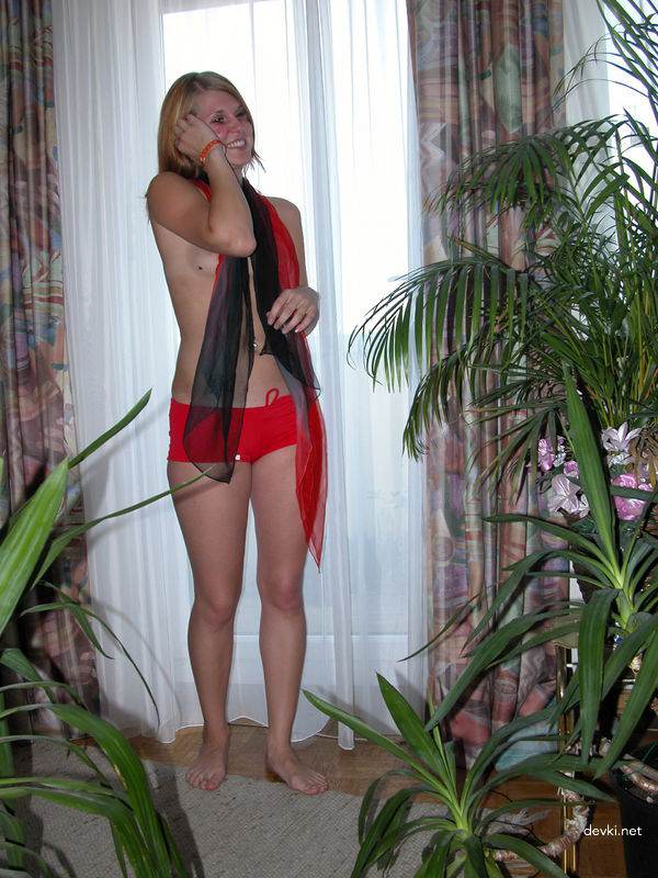Seductive Friend Poses in Tiny Shorts: Amateur Photo Session