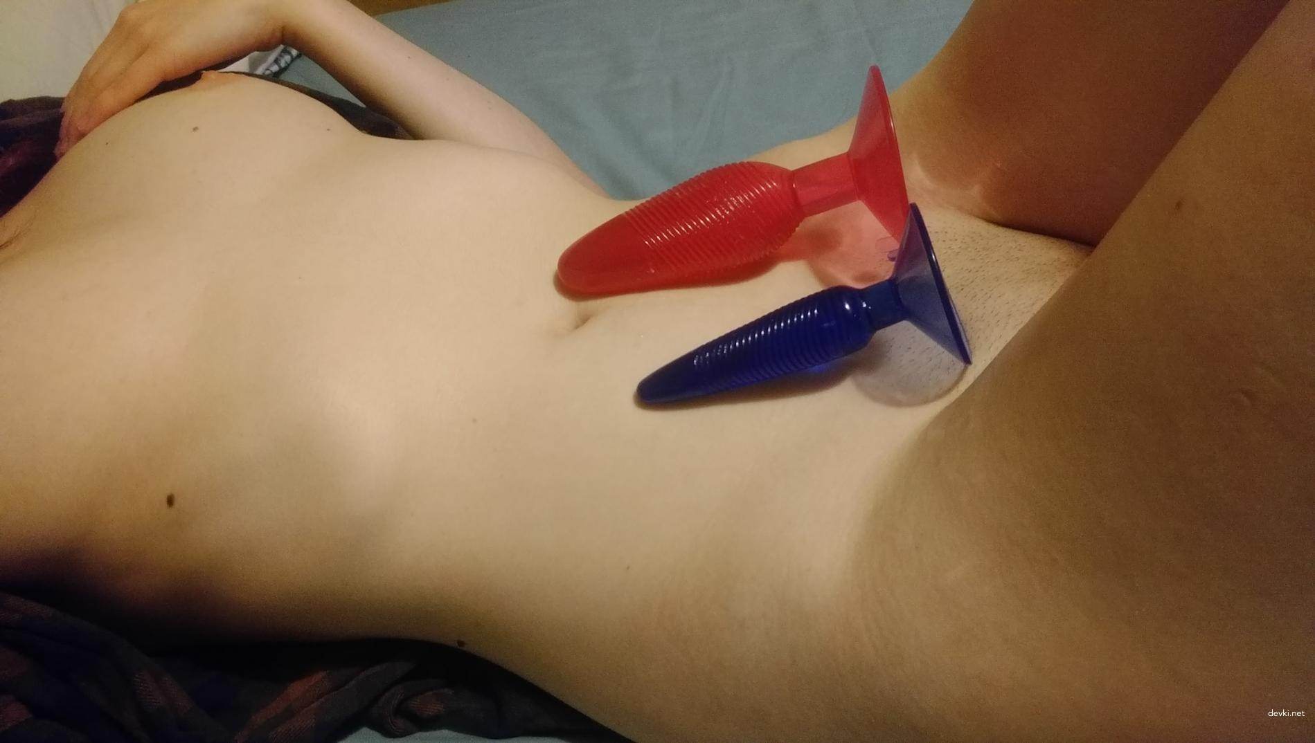 Skinny babe flaunts shaved pussy and perky tits in amateur porn pics