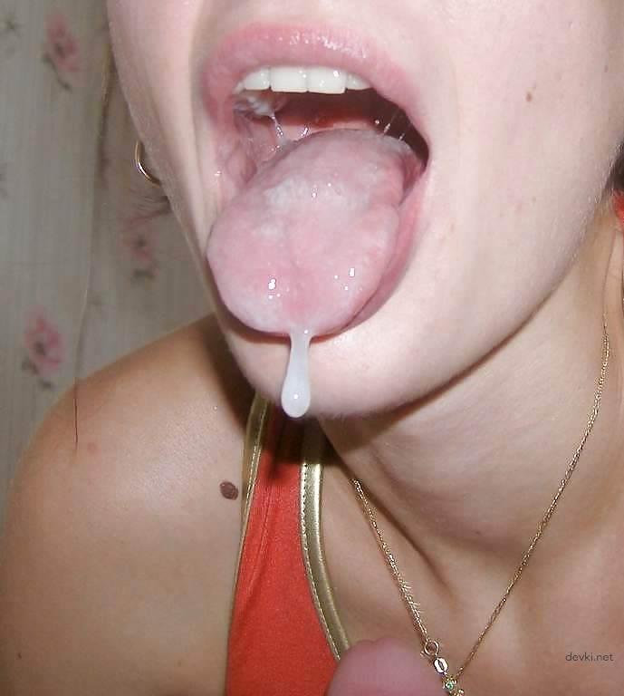 Amateur Blowjob Swallows Cum: Explicit Oral Sex Photo