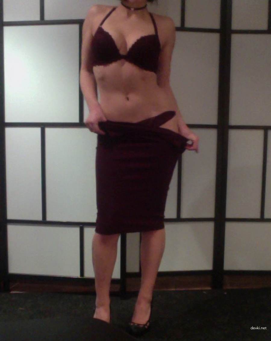 Brunette with amazing ass strips dress and lingerie for amateur porn photo shoot