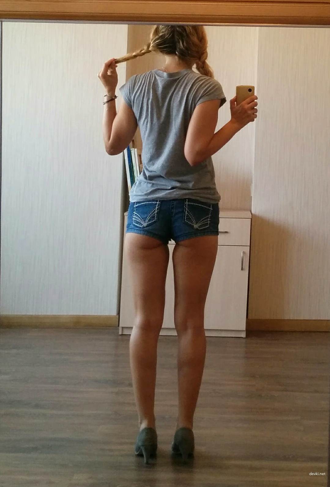 Sensual Amateur Photo in Shorts: Erotic and Provocative Shot