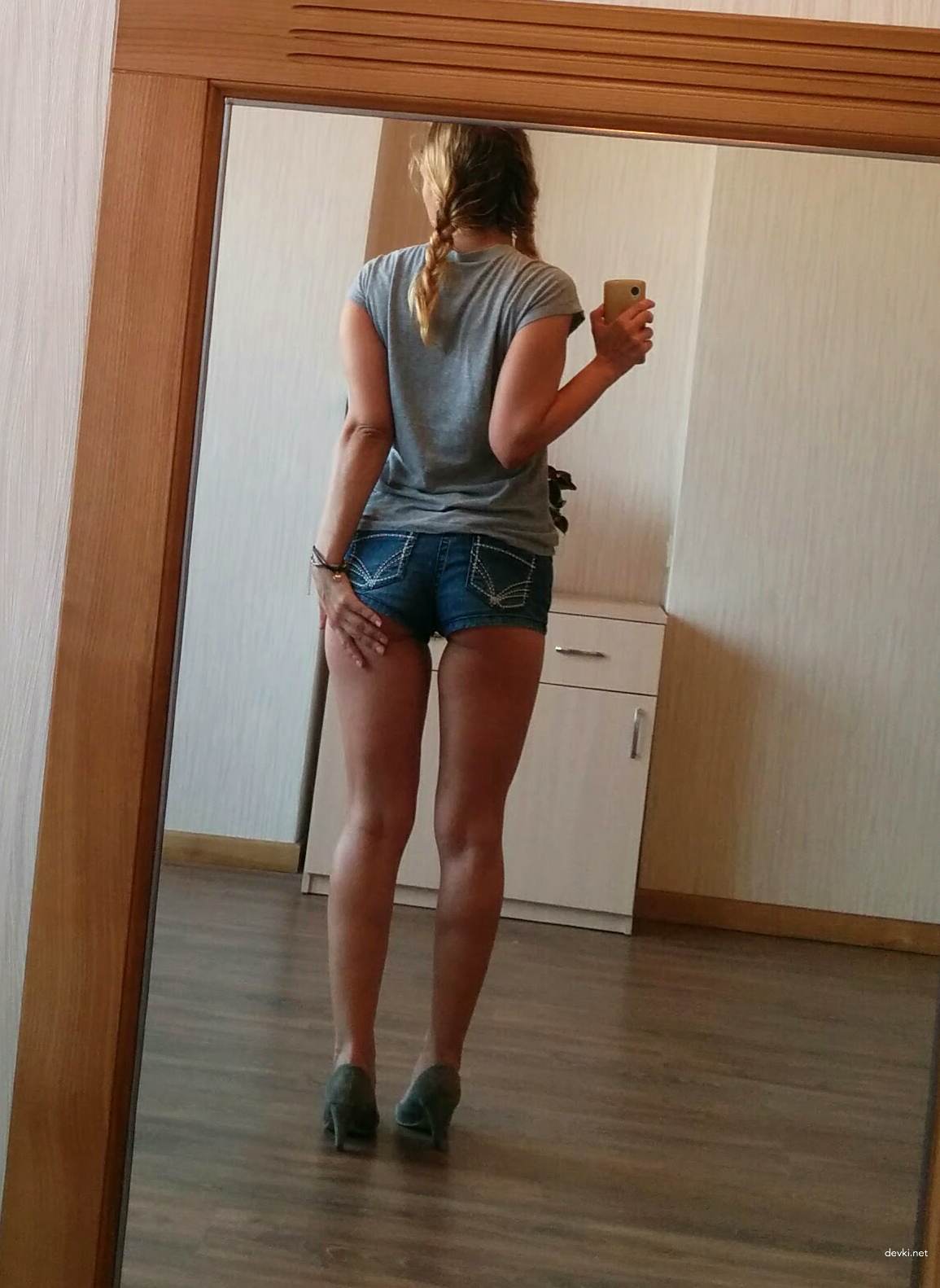 Sensual Amateur Photo in Shorts: Erotic and Provocative Shot