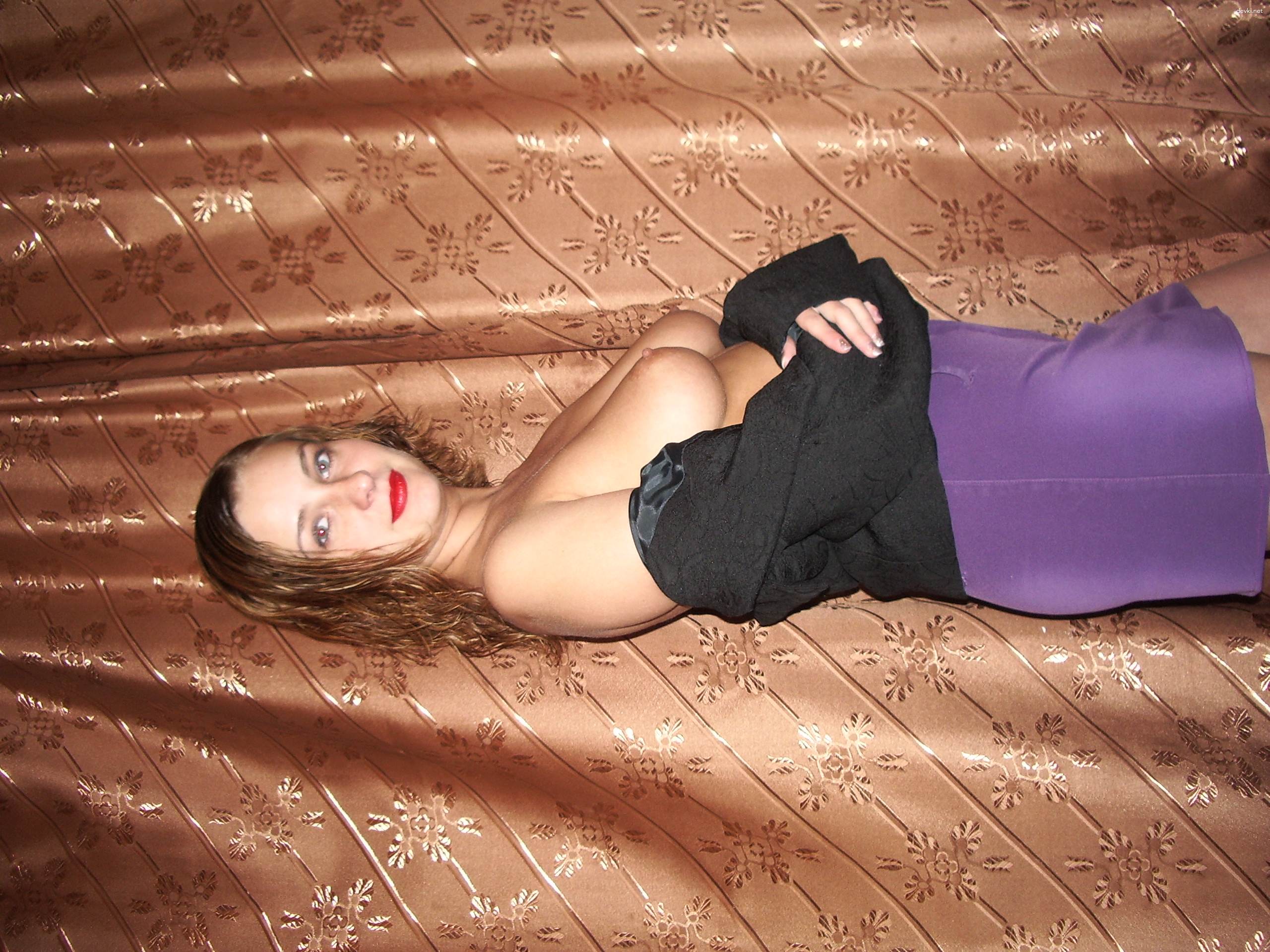 Seductive Amateur Photo: Busty Beauty Flaunting Her Assets