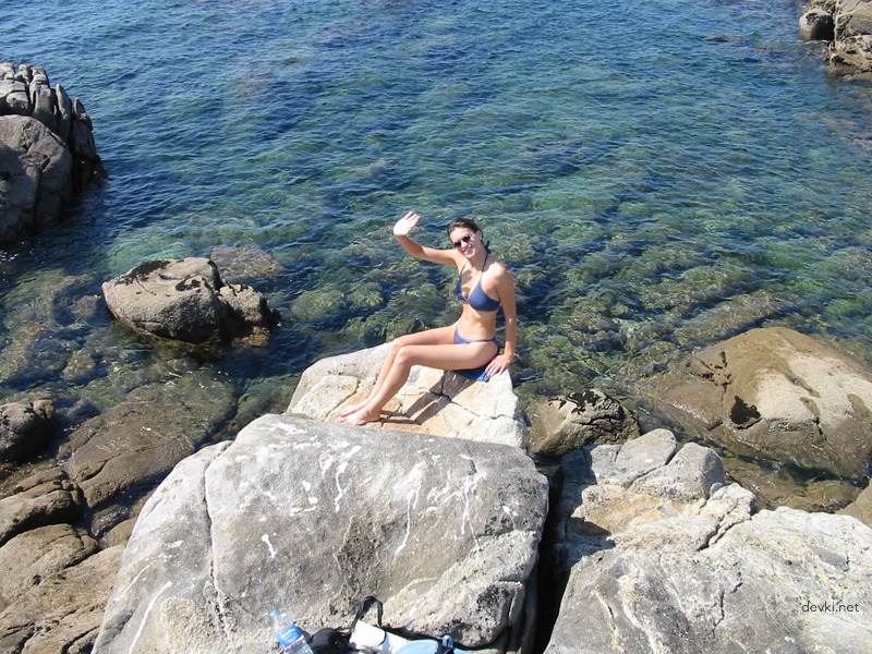 Seductive Woman with Perky Breasts on Vacation: Explicit Amateur Photo