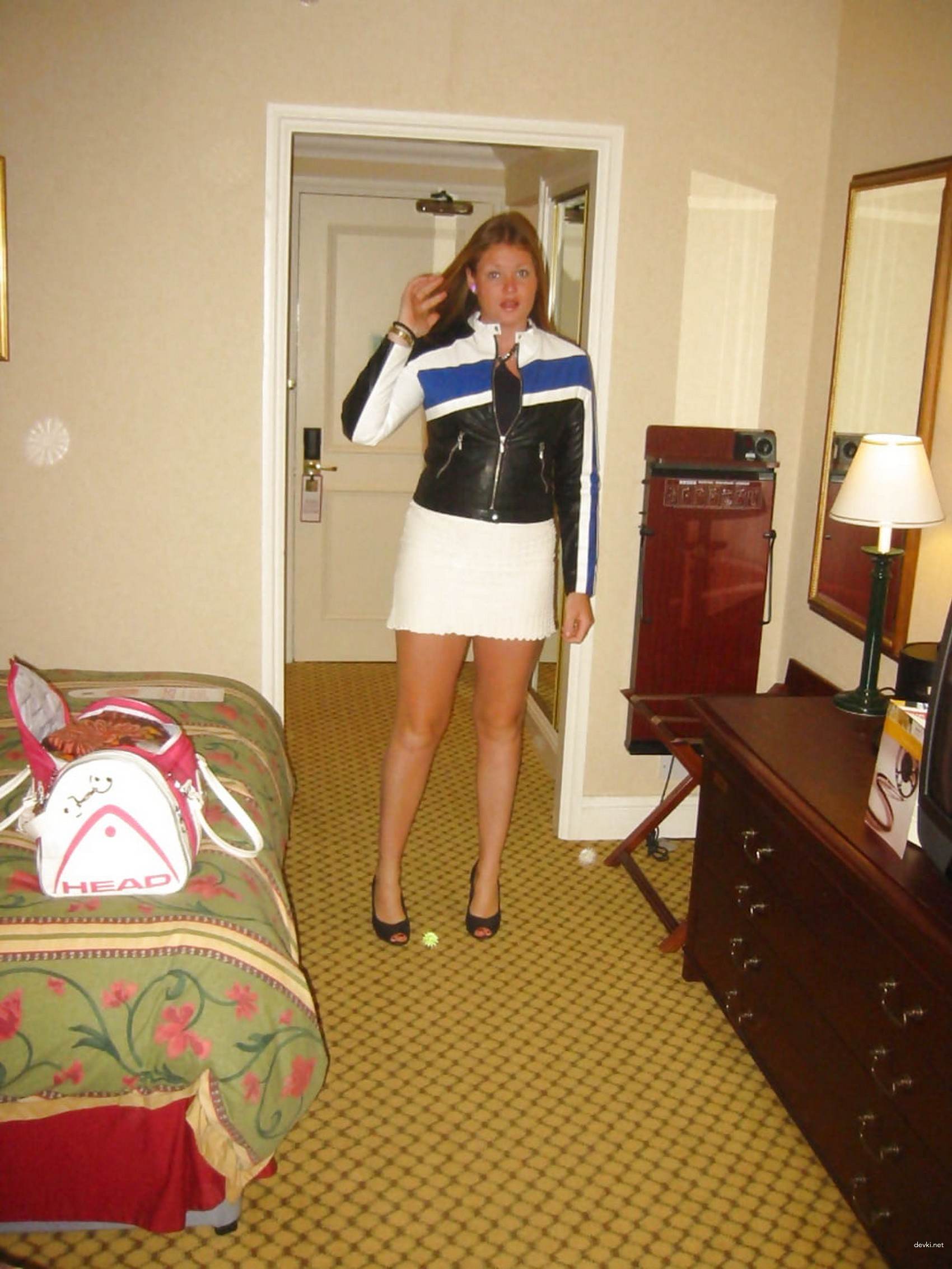 Redhead Amateur Woman's Explicit Intimate Photo Shoot