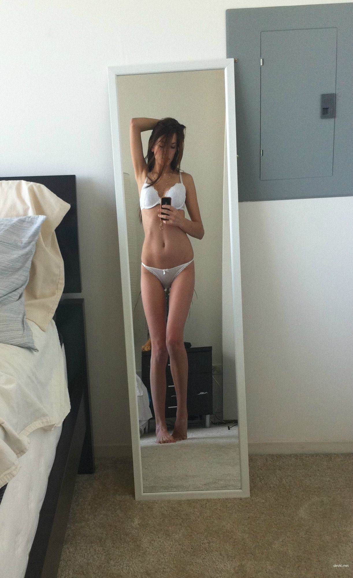 Slim Girl's Erotic Album: Amateur Photos of Hot Young Woman - Uncensored and Explicit