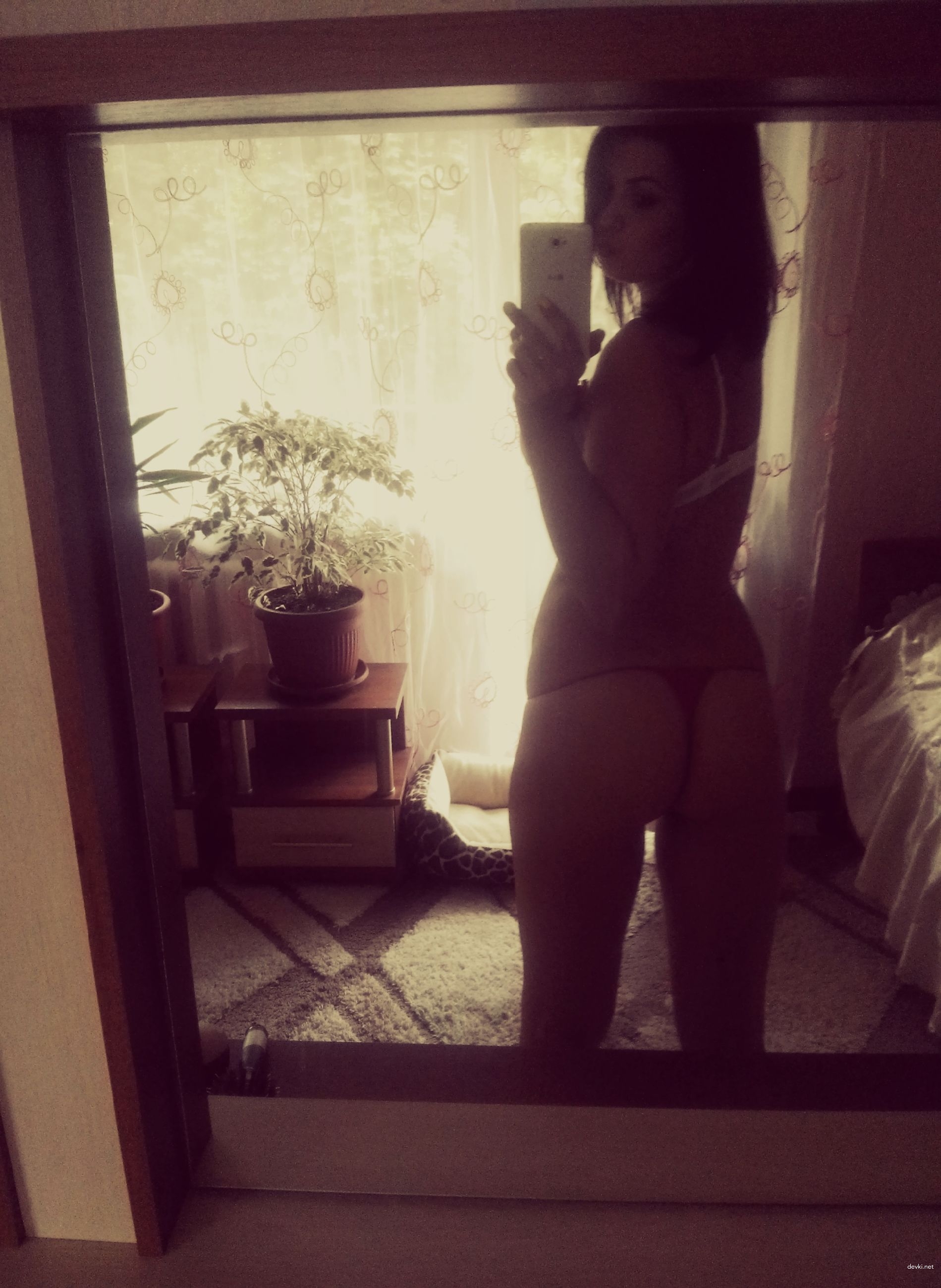 Sexy Brunette Poses Naked and Deepthroats Cock in Amateur Porn Pics