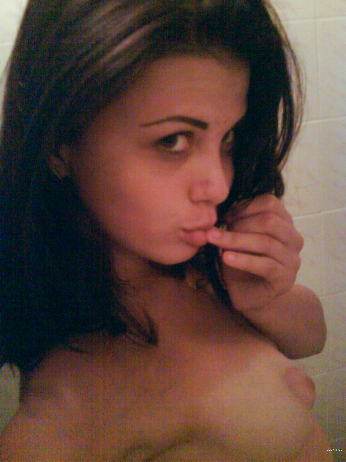 Sexy Brunette Poses Naked and Deepthroats Cock in Amateur Porn Pics