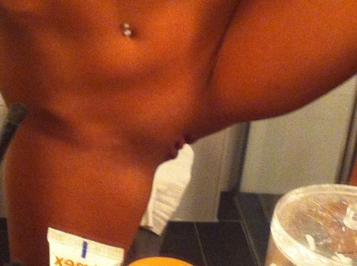 Seductive Nude Amateur Poses Beautifully: Explicit Photo Shoot