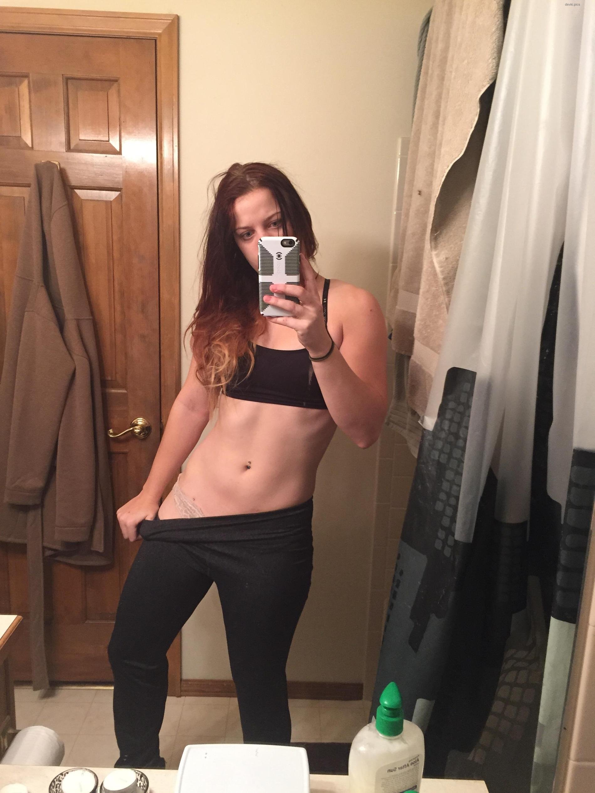 Amateur Stripping in Front of Mirror - Explicit Self-Undressing Photo