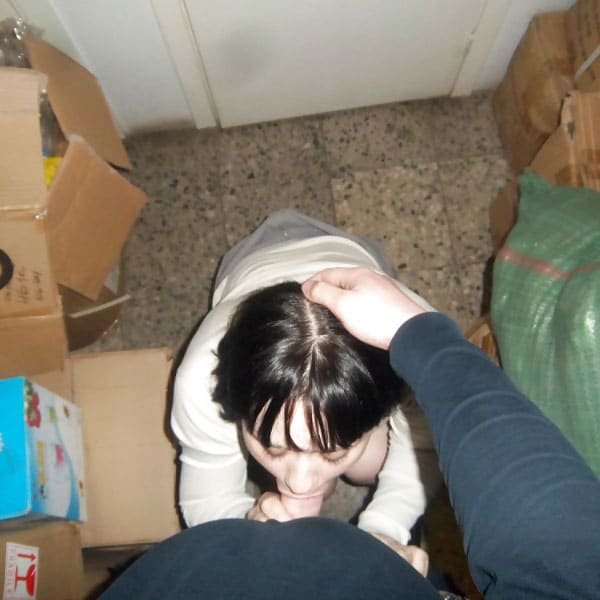 Store Clerk Sucks Security Guard in Storage Room - Amateur Porn Photo