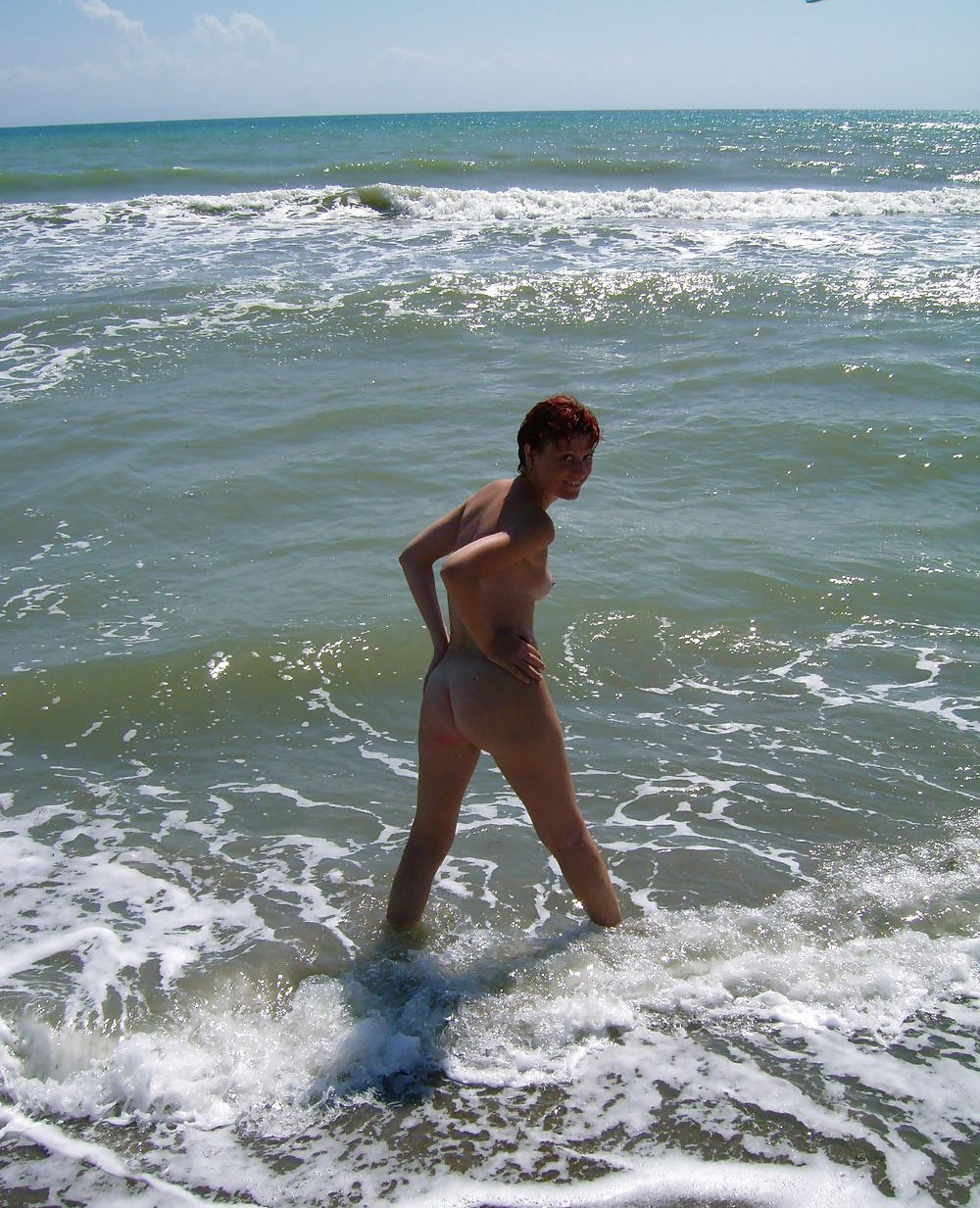 Fiery Nude Redhead by the Sea: Amateur Nudist Exposed