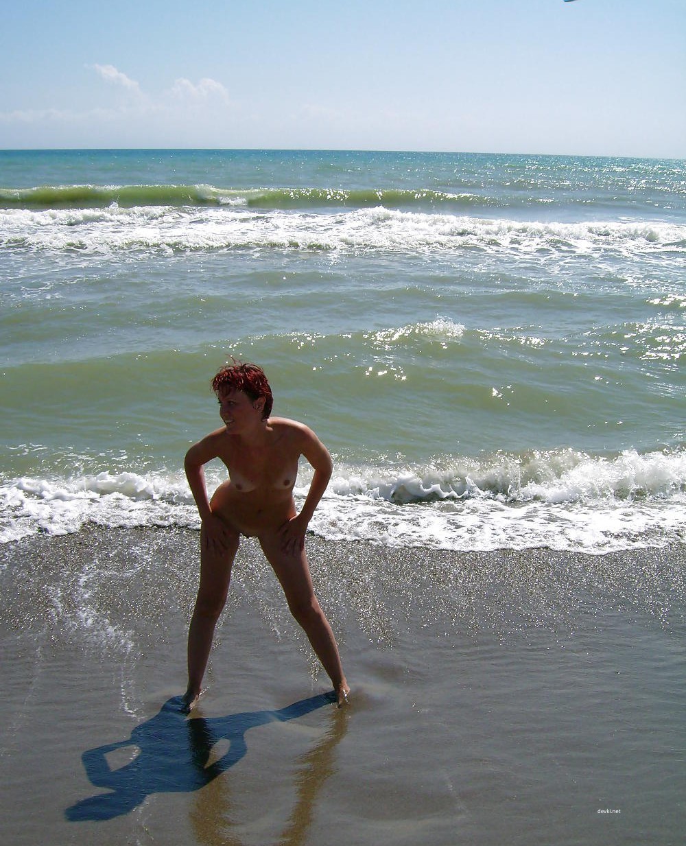 Fiery Nude Redhead by the Sea: Amateur Nudist Exposed