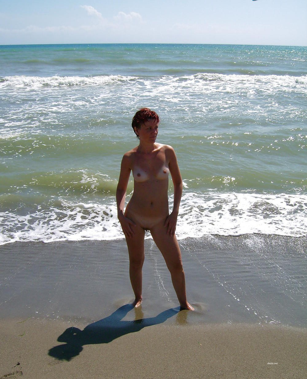 Fiery Nude Redhead by the Sea: Amateur Nudist Exposed