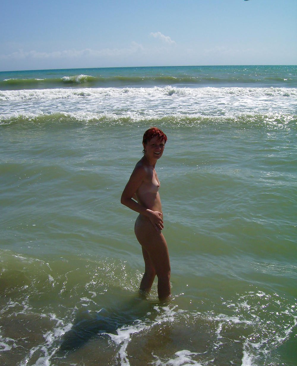 Fiery Nude Redhead by the Sea: Amateur Nudist Exposed
