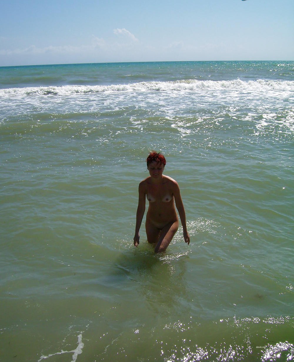 Fiery Nude Redhead by the Sea: Amateur Nudist Exposed