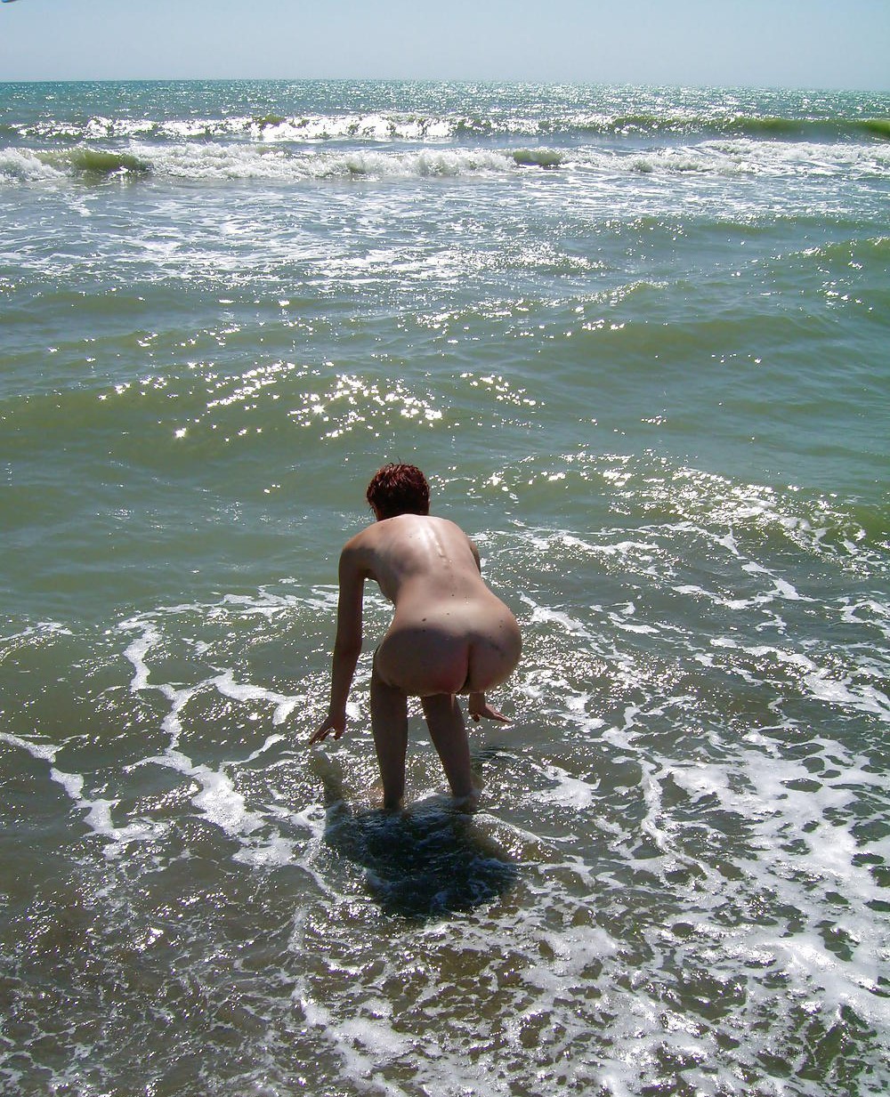 Fiery Nude Redhead by the Sea: Amateur Nudist Exposed