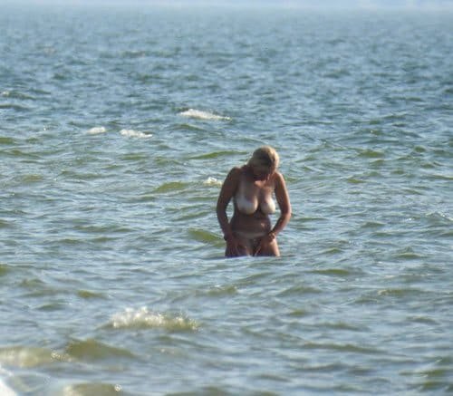 Three Friends Sunbathing Topless on the Beach - Explicit Amateur Photo