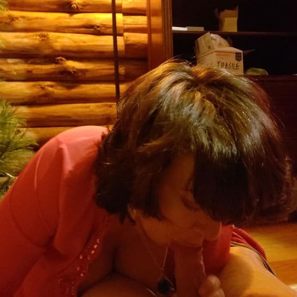 Mature MILF's New Year Blowjob: Explicit Amateur Porn Photo
