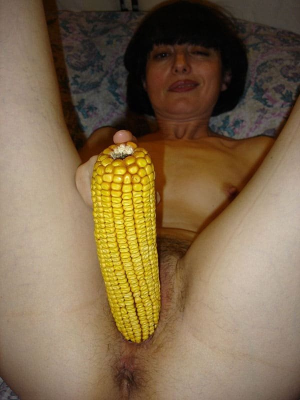 Corn Masturbation: Amateur Porn Photo Featuring Explicit Solo Play
