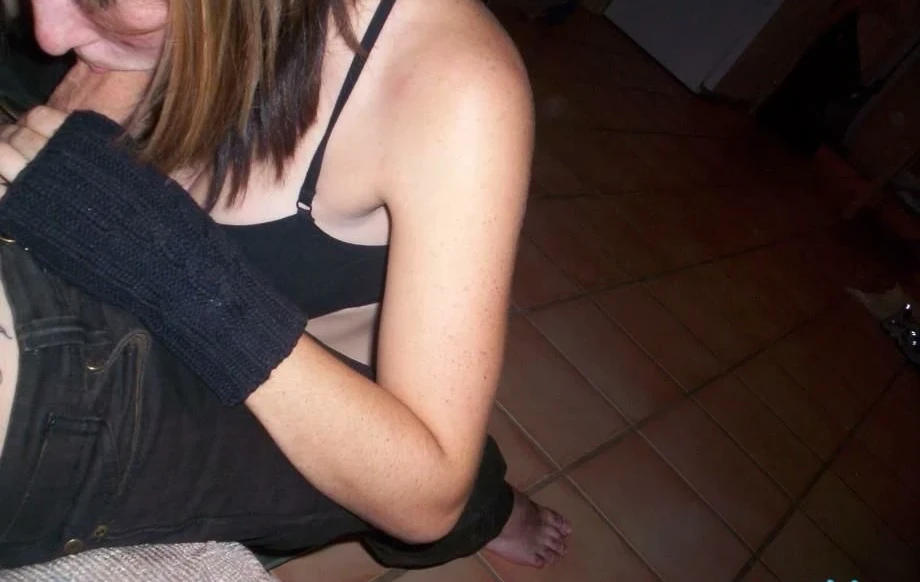 Sexy Babe with Bob Haircut Deepthroats in Amateur Blowjob Photo