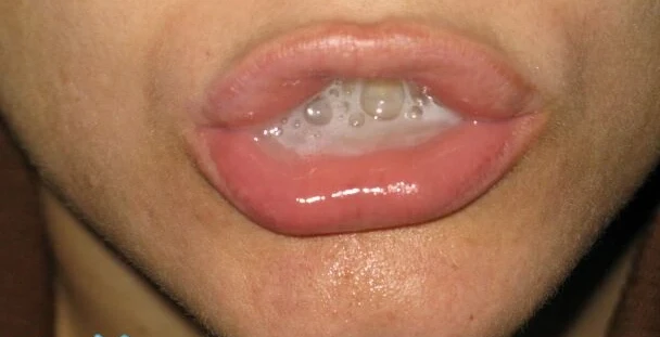 Cum-covered amateur girl gets messy in explicit porn photo shoot