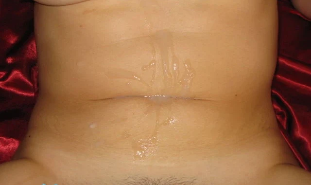 Cum-covered amateur girl gets messy in explicit porn photo shoot