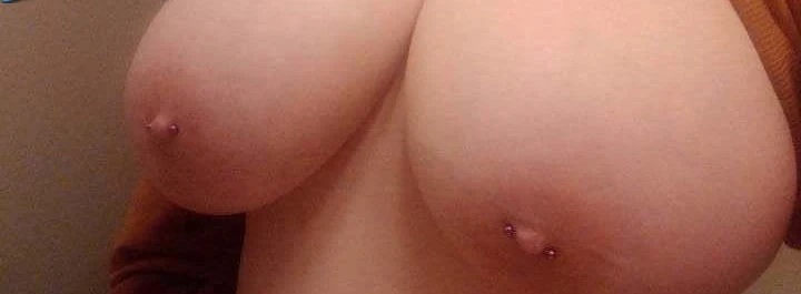 Irishka's Amateur Porn Pics: Explicit Tit Play and More!