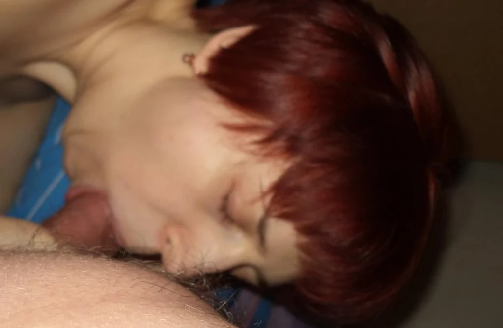 Hot amateur babe Yana deepthroats husband's cock in explicit blowjob photo