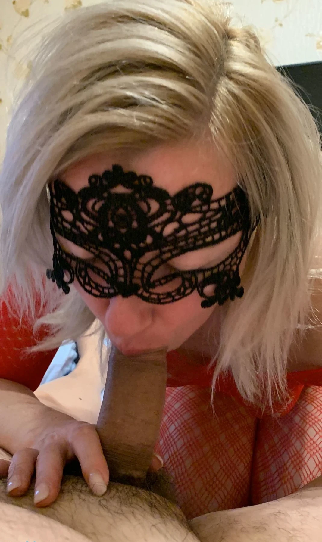 Blowjob in Lace Mask: Amateur Porn Photo with Explicit Oral Sex Action
