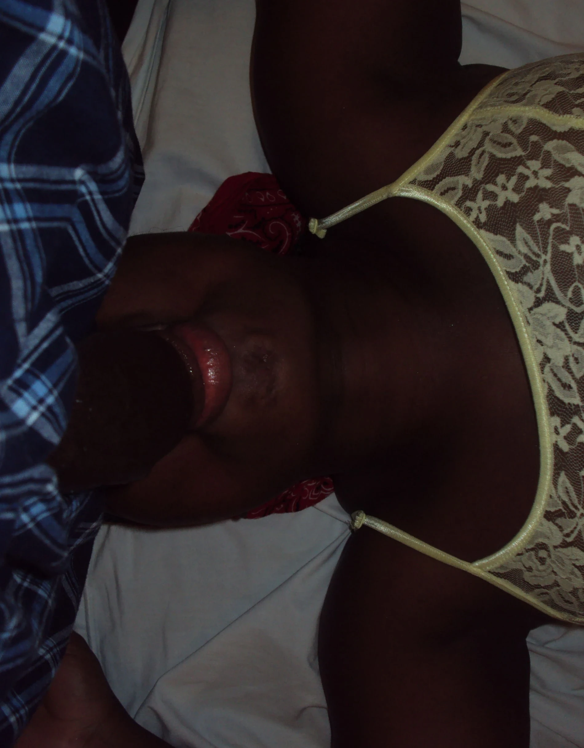 Black chick sucking dick: Amateur interracial blowjob photo