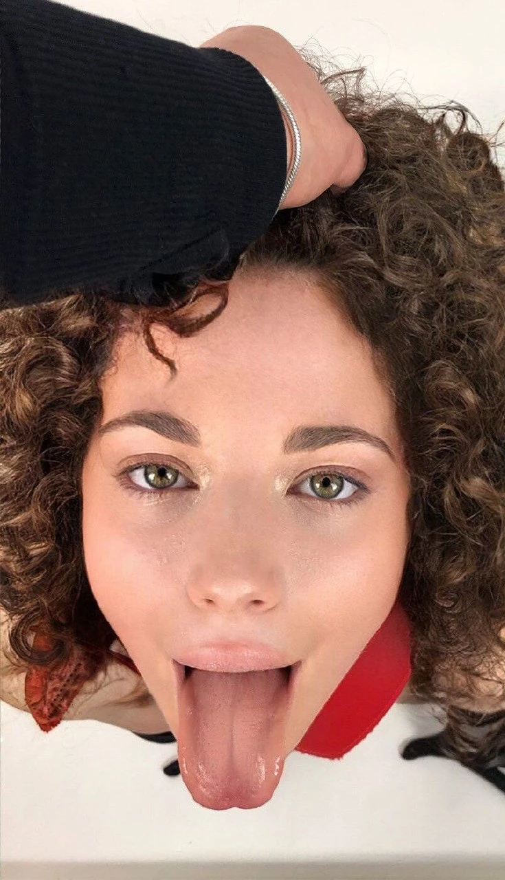 Naughty Curly Haired Amateur in Explicit Porn Photos