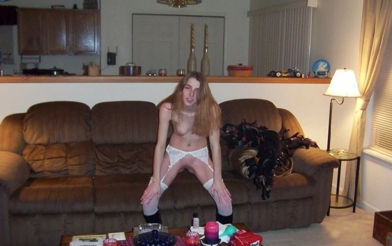 Skinny babe strips and takes cock in explicit amateur porn pic