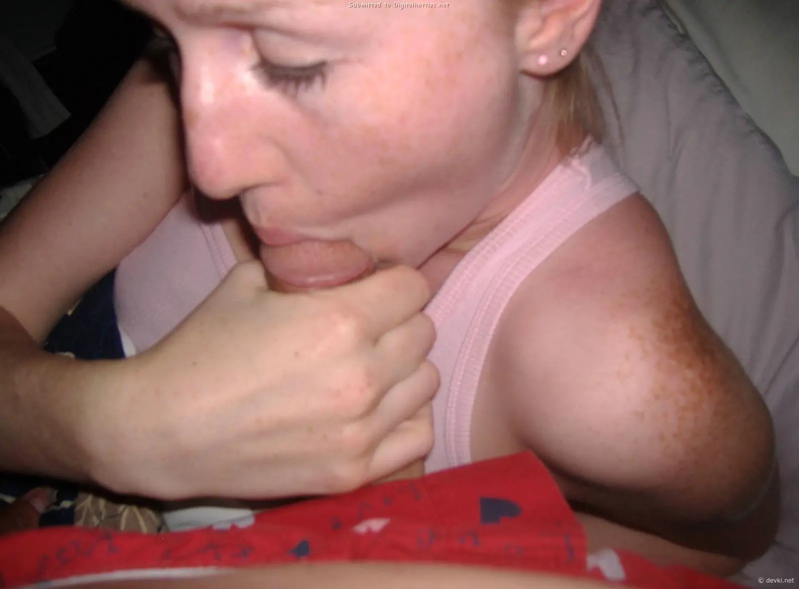 Double Blowjob: Slut Sucks Two Dicks in Amateur Porn Pic