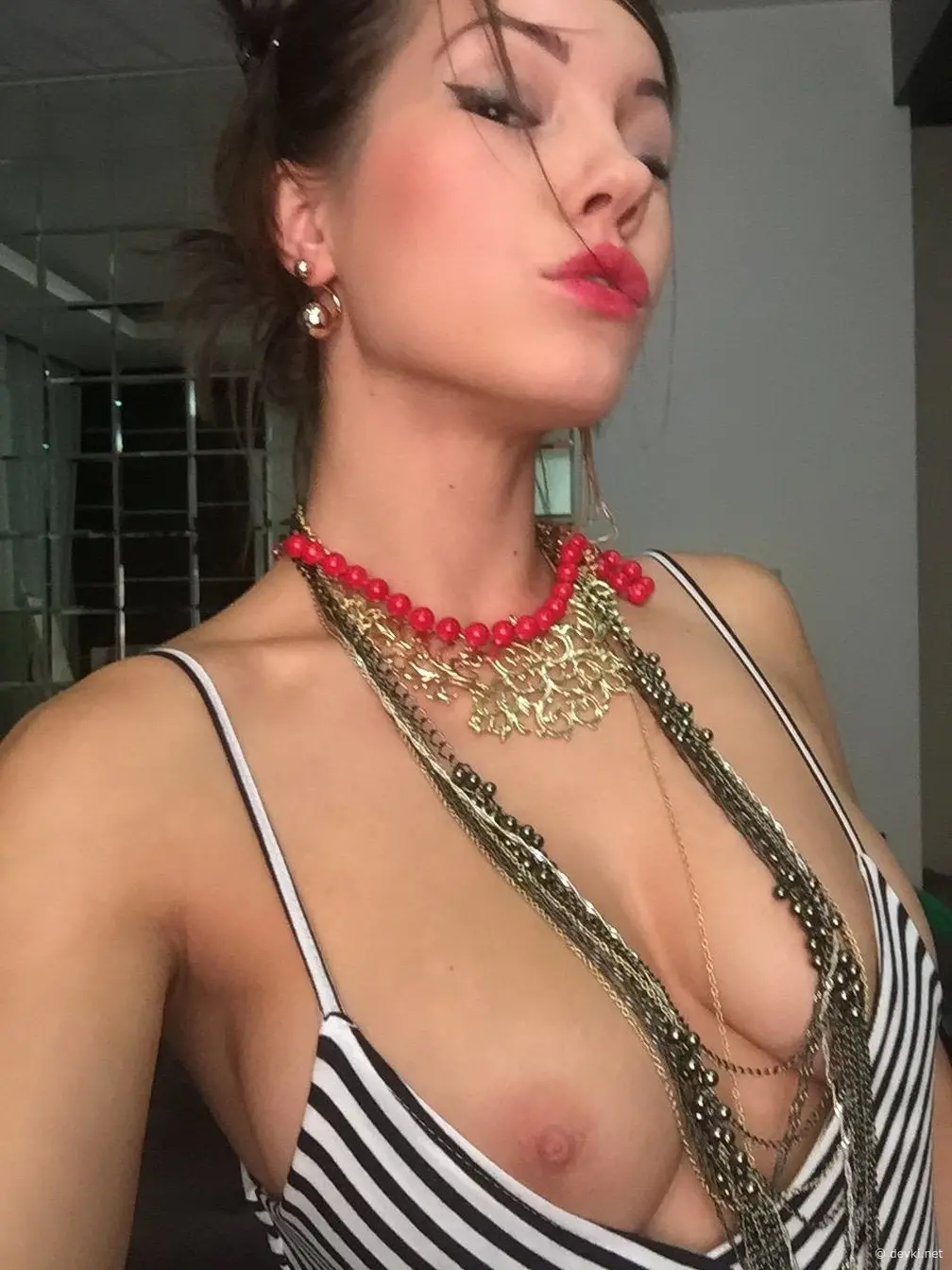 Seductive Brunette Performs Explicit Nude Acts on Camera