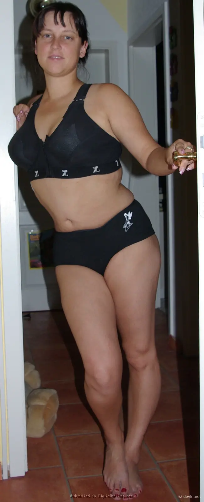 Smiling amateur posing with cock: Explicit homemade porn pic