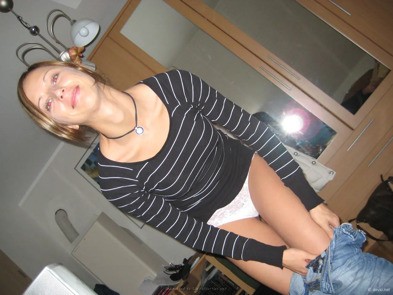 Stunning Woman Engages in Explicit Sex - Amateur Porn Photo