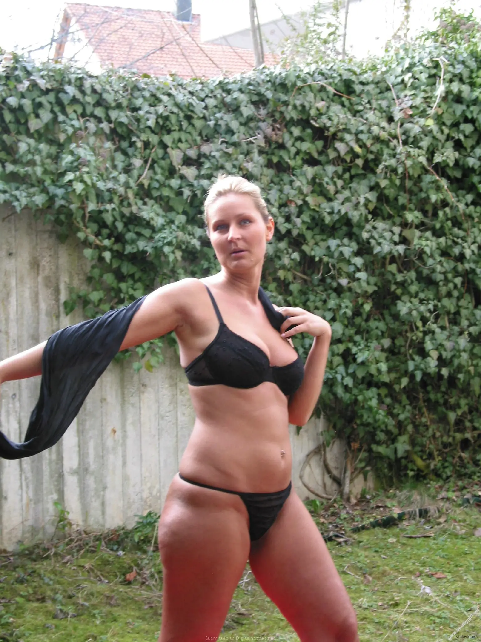 Topless Woman Posing Explicitly - Amateur Nude Photo
