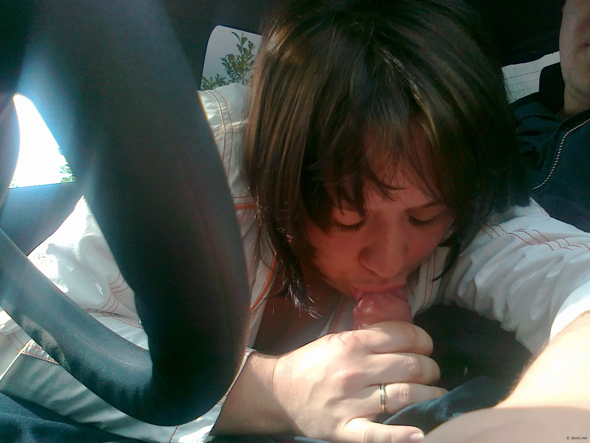 Natalya from Tallinn Gives Blowjob in Car - Explicit Amateur Porn Photo