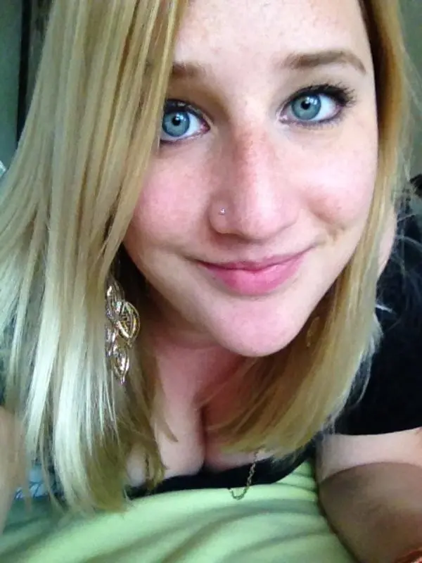 Blonde Gives Blowjob to Guy - Amateur Porn Photo