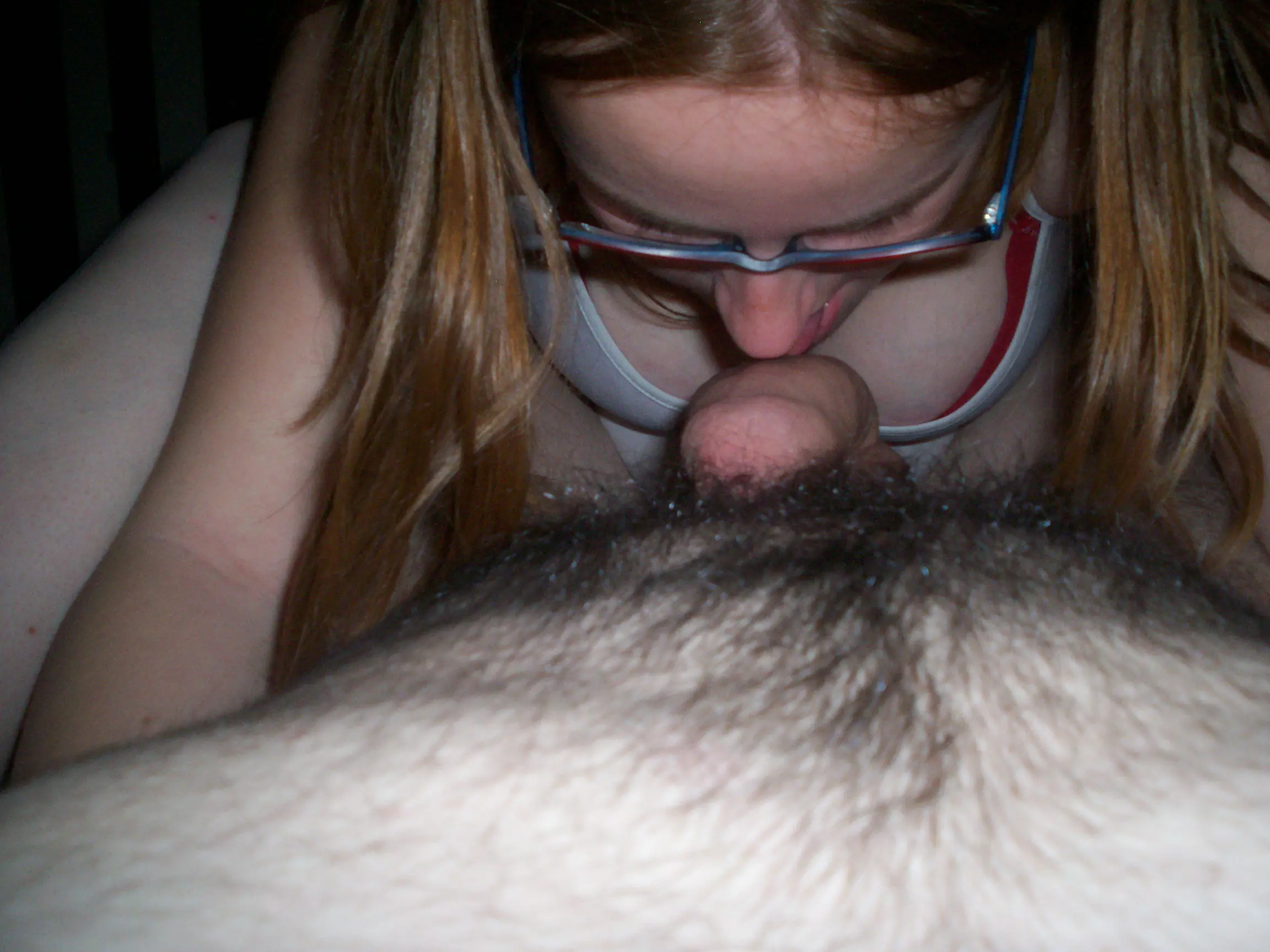 Redhead babe sucks cock and shows hairy pussy in amateur porn pic