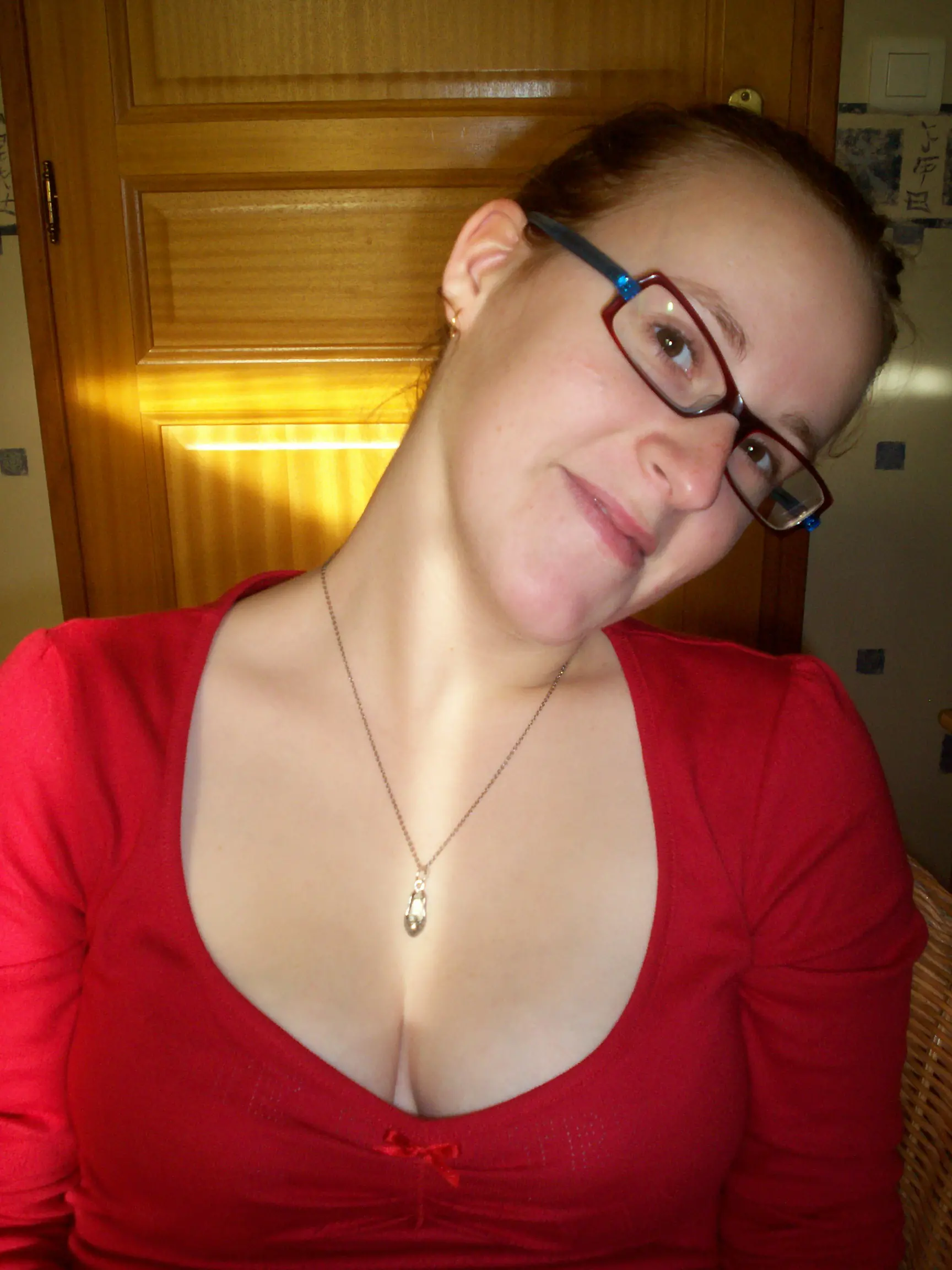 Redhead babe sucks cock and shows hairy pussy in amateur porn pic